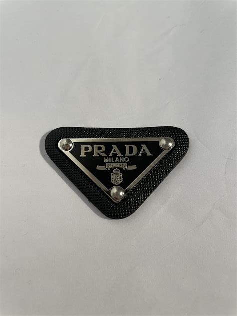 prada patch toppa|Prada triangle.